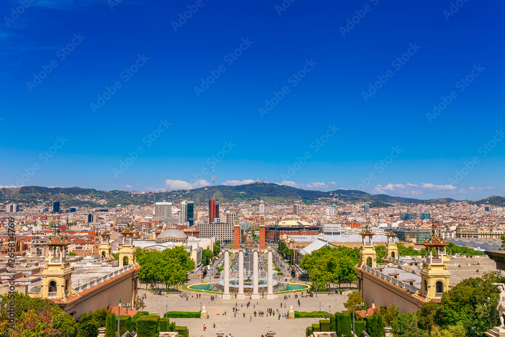 Skyline landscape of beautiful Barcelona from the Montjuic in a clear blue sky and sunny day. Famous tourist destination Catalonia, Spain