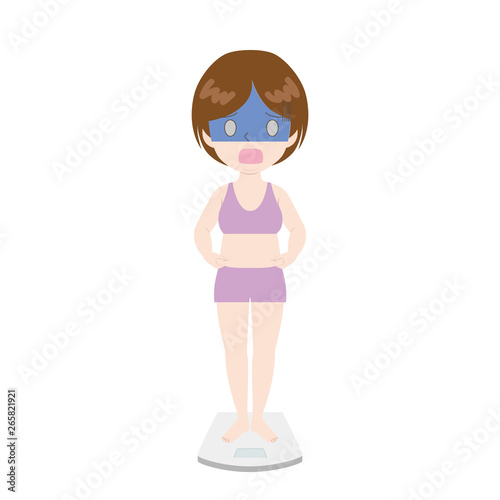 体重計の上で青ざめる女性