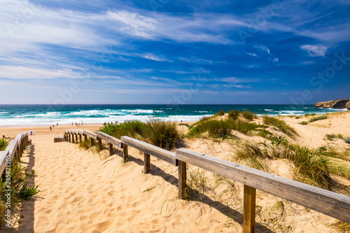 View of the Monte Clerigo beach on the western coastline of Portugal  Algarve. Stairs to beach Praia Monte Clerigo near Aljezur  Costa Vicentina  Portugal  Europe.