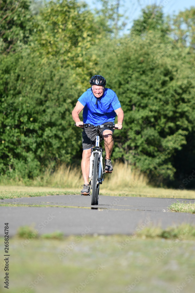 Male Cyclist And Anxiety Wearing Helmet Cycling