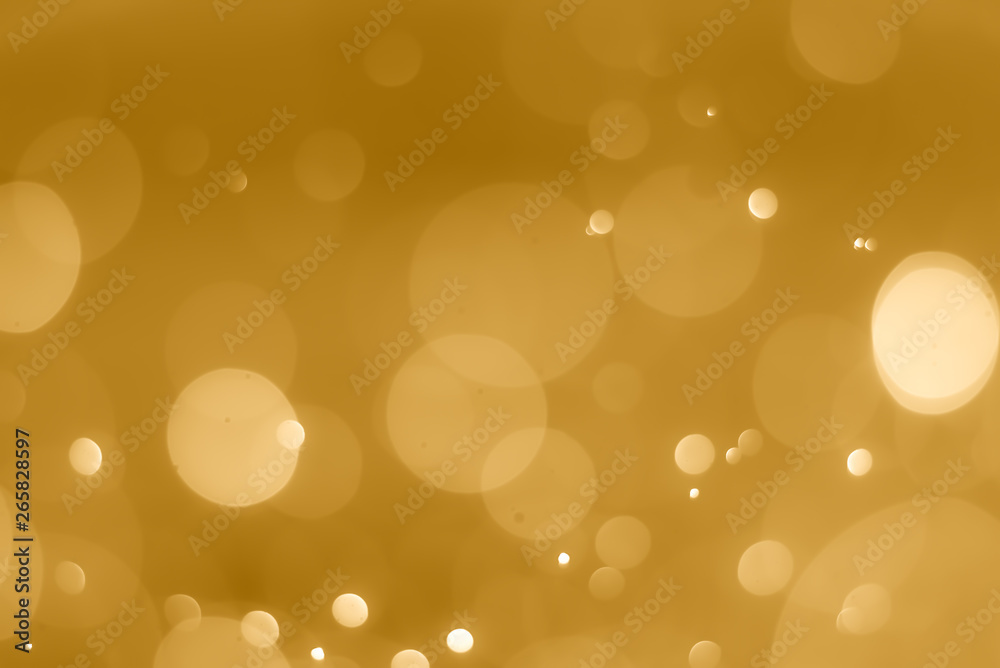 abstract soft bokeh light effect with golden background abstract soft bokeh light effect with golden background