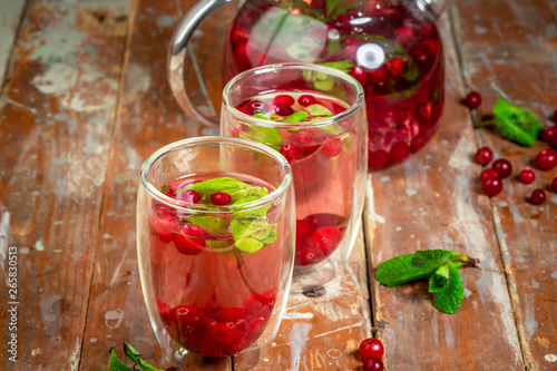 Sassy water. Fresh cool water with Cranberries and Mint. Detox and weight loss. Copy space