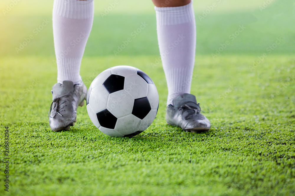 young boy soccer players run to trap and control the ball for shoot to goal. young boy soccer players run to trap and control the ball for shoot to goal.