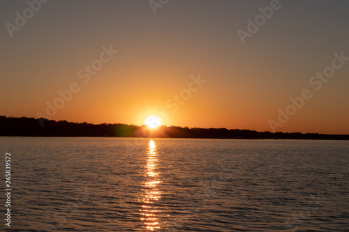 Sunset on a calm lake in Texas © Garrett