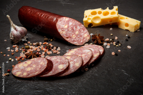 sliced jalapeno cheddar summer sausage with cheese and garlic
