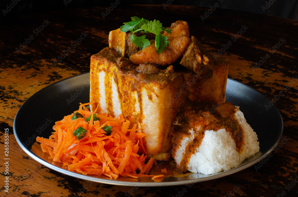 Stockfoto A Durban Bunny Chow or quarter mutton bunny served with