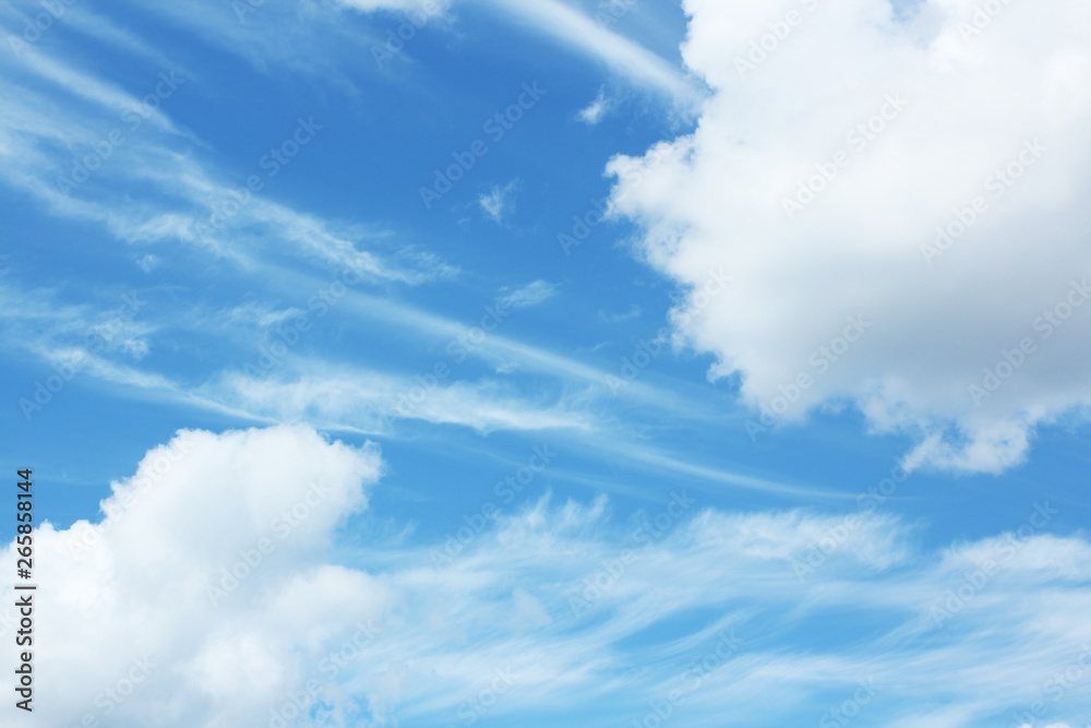 Fototapeta premium White fluffy clouds in the blue sky