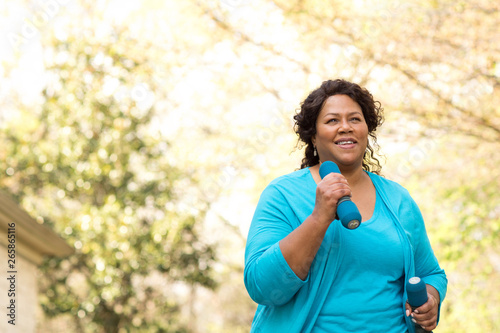 Photography Beautiful mature African American woman smiling and laughing.