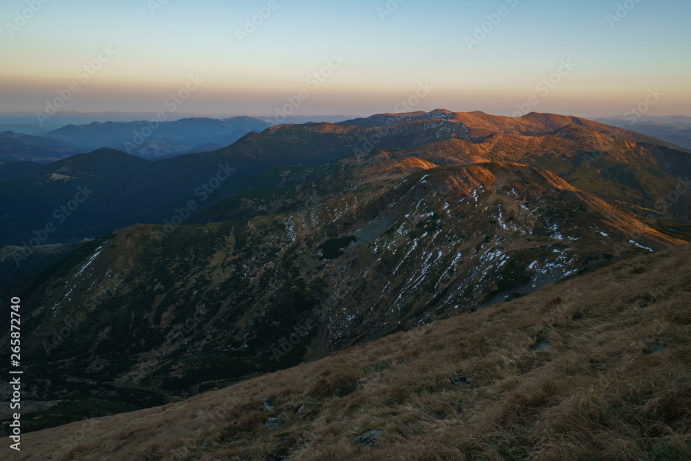 A little snow on mountains sunset - landscape of the Ukrainian Carpathian Mountains, Chornohora
