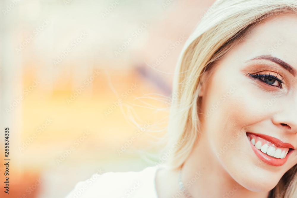 Portrait of a beautiful, blonde, happy and smiling woman. Photo with space for text Portrait of a beautiful, blonde, happy and smiling woman. Photo with space for text