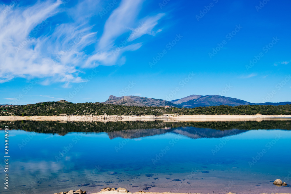 crystal clear water reflection lake El Atazar Madrid