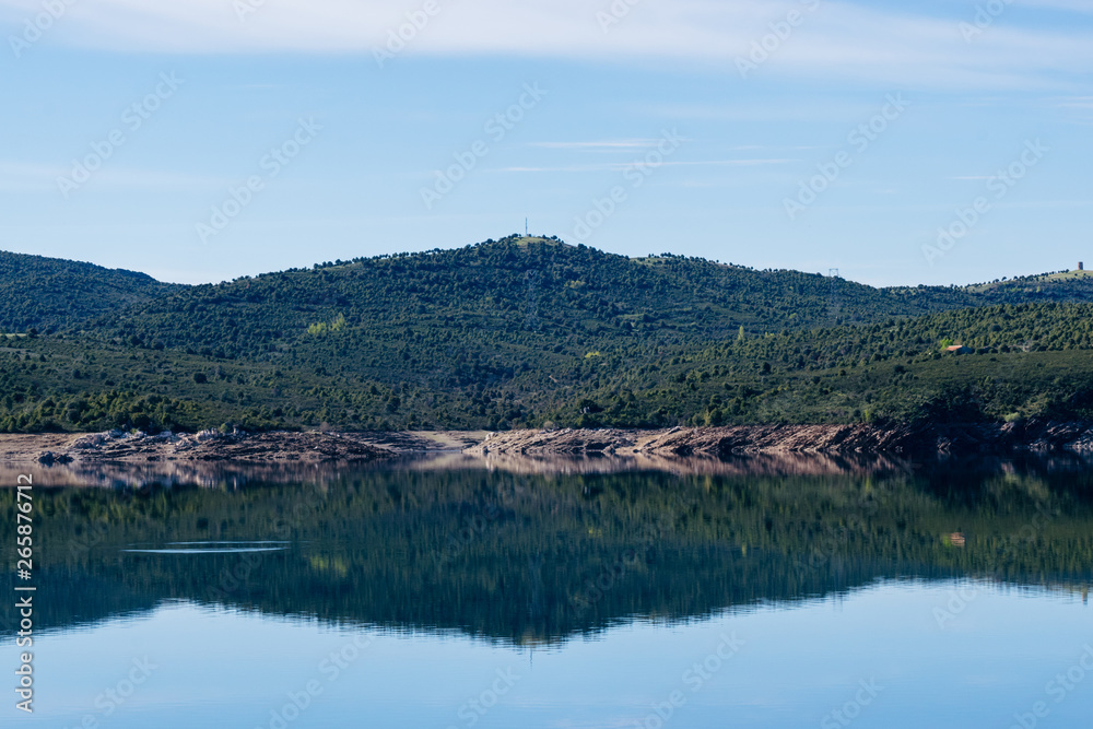 crystal clear water reflection lake El Atazar Madrid