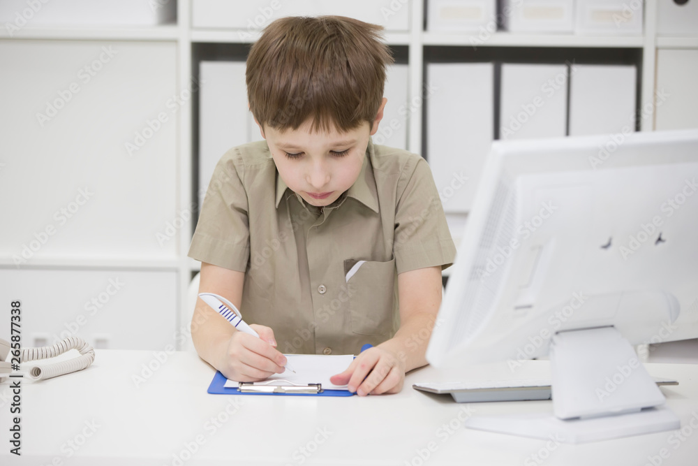 Junior school student doing homework Junior school student doing homework