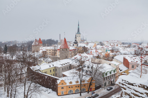 Winter cityscape of old town of Tallinn, Estonia. Rooftop view with magical medieval charm