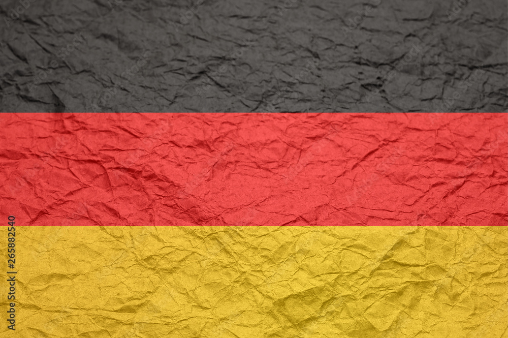 Germany flag on old crumpled craft paper.