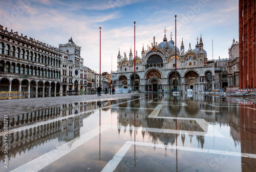 St Mark's square flooded by high tide (Acqua alta), Venice, Italy photo