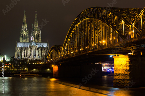 dom of cologne and hohenzollern bridge at night