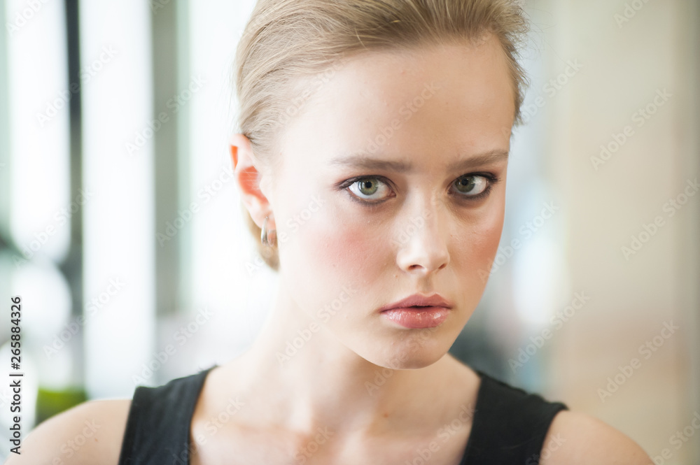 Close up portrait of beautiful young blonde woman Close up portrait of beautiful young blonde woman