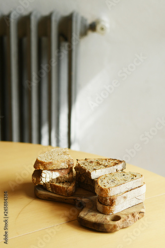 Pile of bread lying on the table with copyspace
