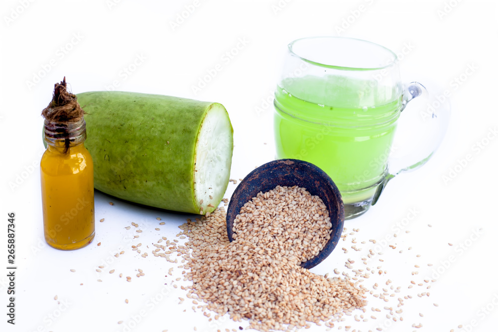 Best treatment to reduce Grey hair isolated on white . Bottle gourd oil well mixed with sesame seed bottle gourd and sesame seed also present. Stock Photo | Adobe Stock Best treatment to reduce Grey hair isolated on white . Bottle gourd oil well mixed with sesame seed bottle gourd and sesame seed also present. Stock Photo | Adobe Stock