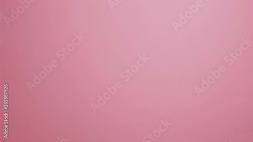 crossed fingers of a girl on a pink studio background, hands showing a hashtag shape, concept social networks, indexing, a screensaver for captions