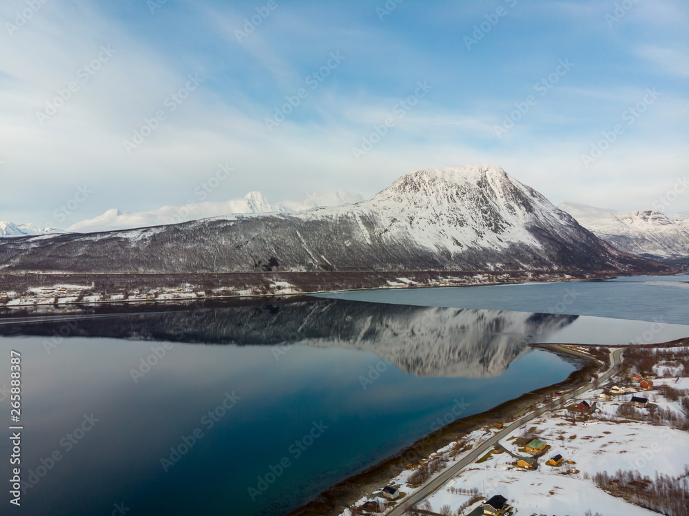 Fjord wtih reflection of blue sky, Norway