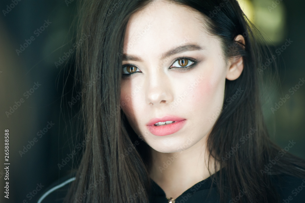 Close up portrait of beautiful young brunette woman Close up portrait of beautiful young brunette woman
