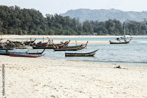 fishing boats on nai yang beach 