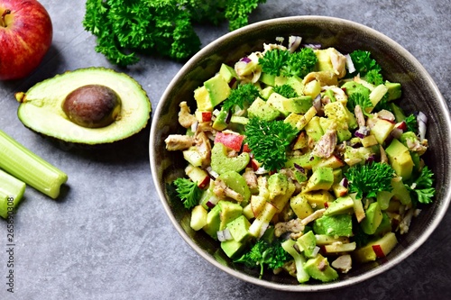Avocado, apple and chicken salad. Paleo and keto diet healthy dish