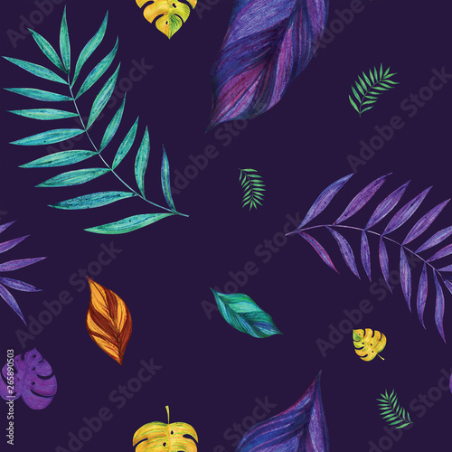 Seamless jungle pattern. Tropical leaves on a dark violet background. Bright colors.