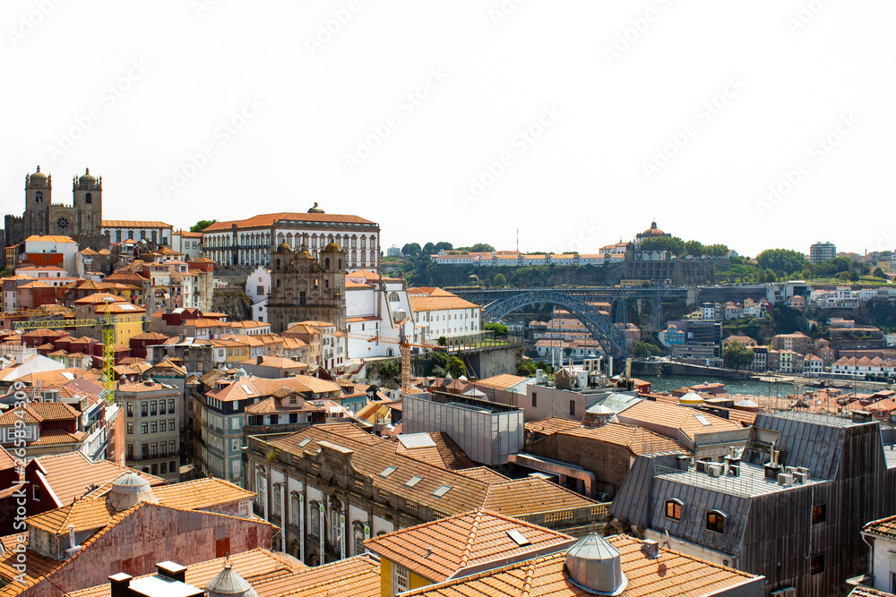Dom Luis I Bridge across Douro River, Porto Cathedral (Sé do Porto) and Monastery of Serra do Pilar background, Porto, Portugal