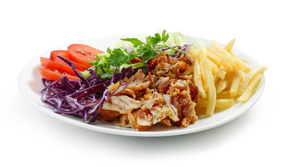 plate of chicken kebab and vegetables