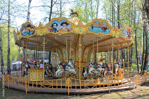 Multi-colored children's carousel retro style with horses