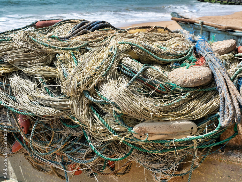 Fishing net on the beach in Sri Lanka. Sunny day. Close up.
