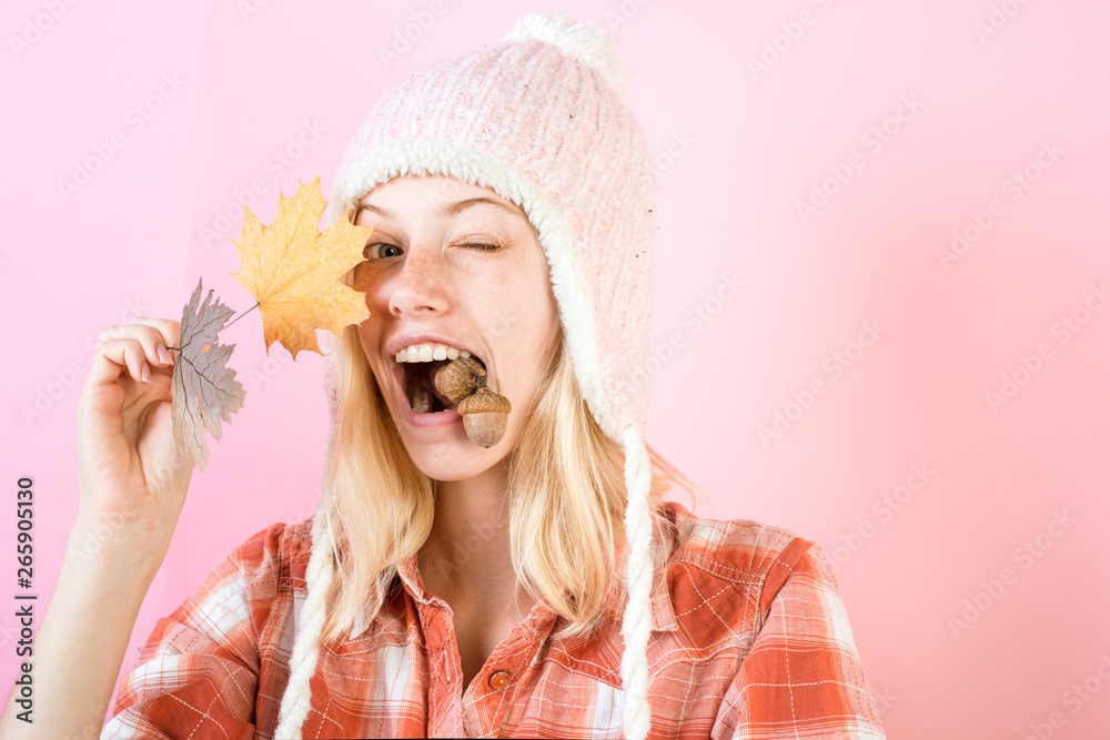 Surprise woman playing with leaves and looking at camera. Girl in autumn are getting ready for autumn sale. Girl in autumn playing with leaves on autumn leaves background. Surprise woman playing with leaves and looking at camera. Girl in autumn are getting ready for autumn sale. Girl in autumn playing with leaves on autumn leaves background.