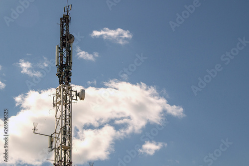 Mobile phone communication antenna tower with the blue sky and clouds, Telecommunication tower