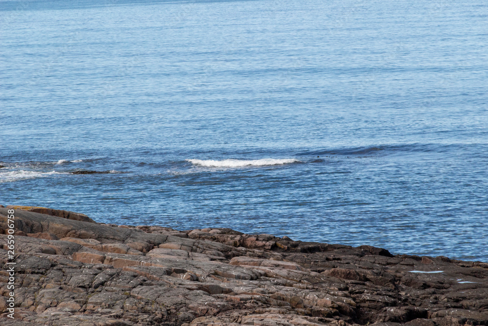 Beautiful aerial view on sea surface and rocky coast Beautiful aerial view on sea surface and rocky coast