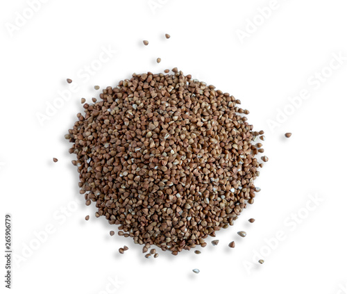 Buckwheat groats isolated on white background. Photo heap buckwheat view from the top. Healthy diet. Vitamins in cereals. Proper nutrition