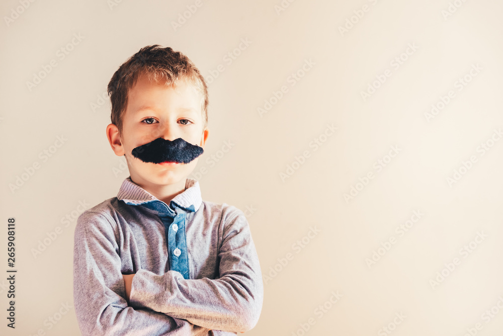 Child with mustache isolated on white.