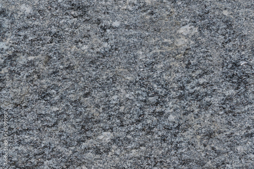 Texture of natural unpolished gray granite. Great design for any purposes.