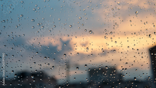 raindrops on the glass macro photo. Texture of the water raindrops