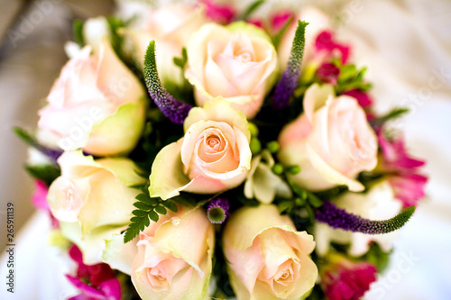 Bridal bouquet from gently pink roses and freesias