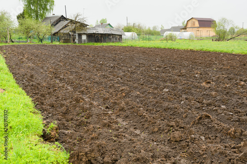 Dug up a field near the country house for planting vegetables or crops