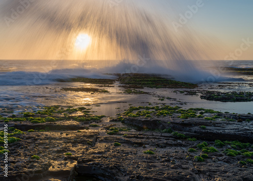 ocean spray during sunrise photo