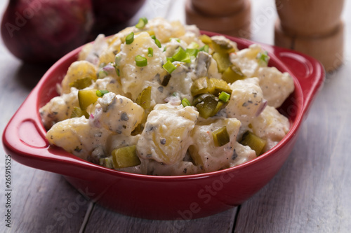 Fotografie Potato salad with mayonnaise dressing