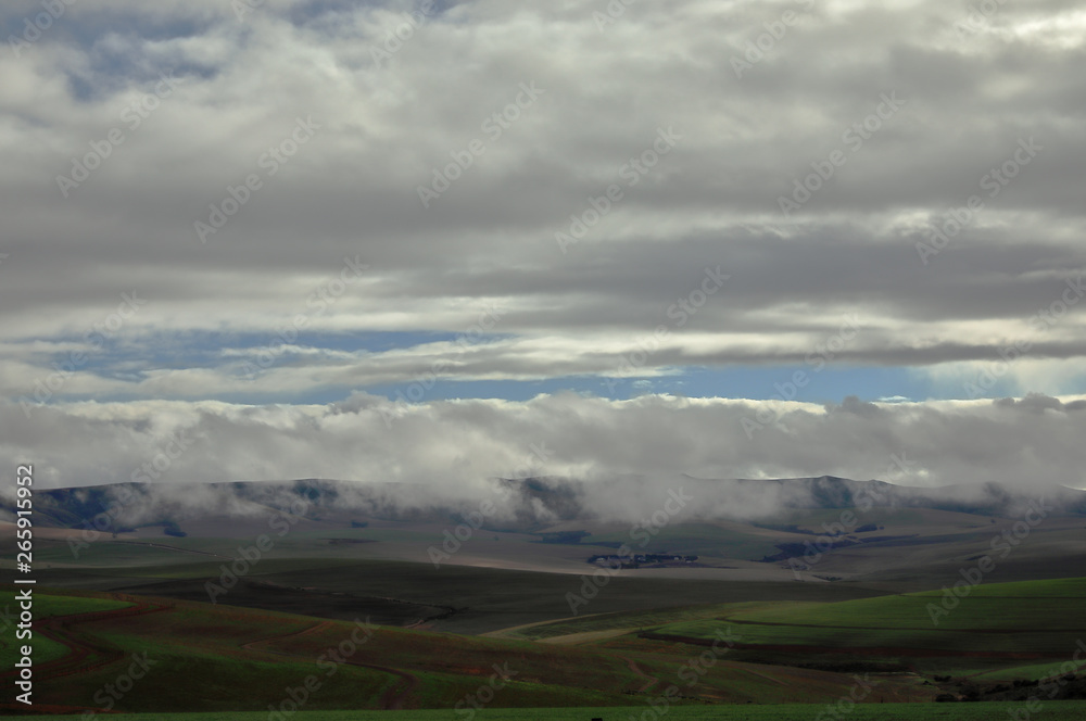 A hilly, green and clouded Overberg landscape
