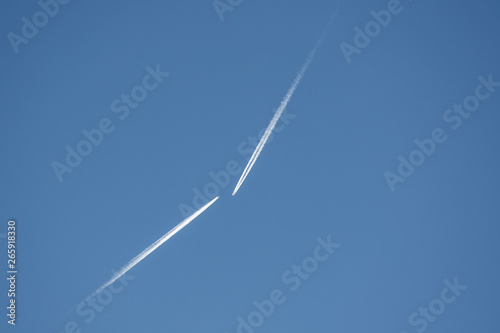trails and clouds in the sky 