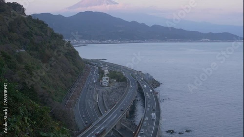 Mt. Fuji over the Highway by the Sea (time lapse/tilt up/zoom in): from Satta Pass in Shizuoka Pref. photo