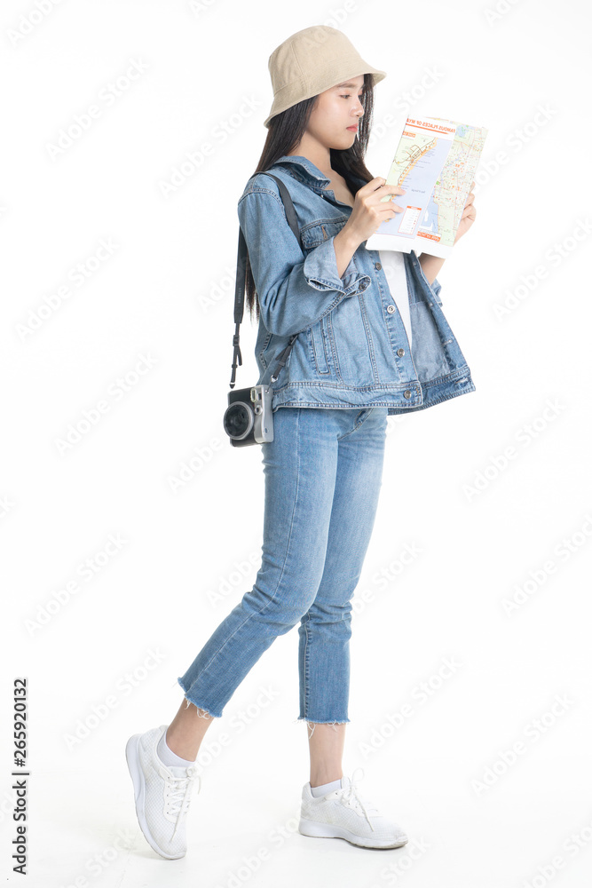Beautiful young woman smiling and pulling pink colour luggage isolated on white background.Asian woman going to summer vacation.Travel trip funny. Beautiful young woman smiling and pulling pink colour luggage isolated on white background.Asian woman going to summer vacation.Travel trip funny.