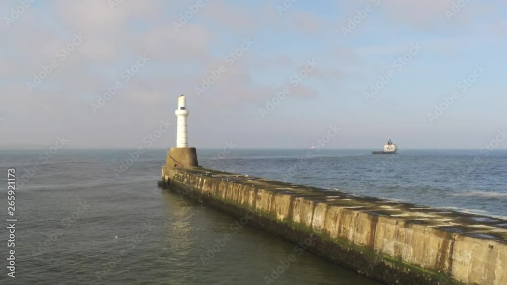 Aberdeen Lighthouse in front of Blue Sky and Clouds Aberdeen Lighthouse in front of Blue Sky and Clouds
